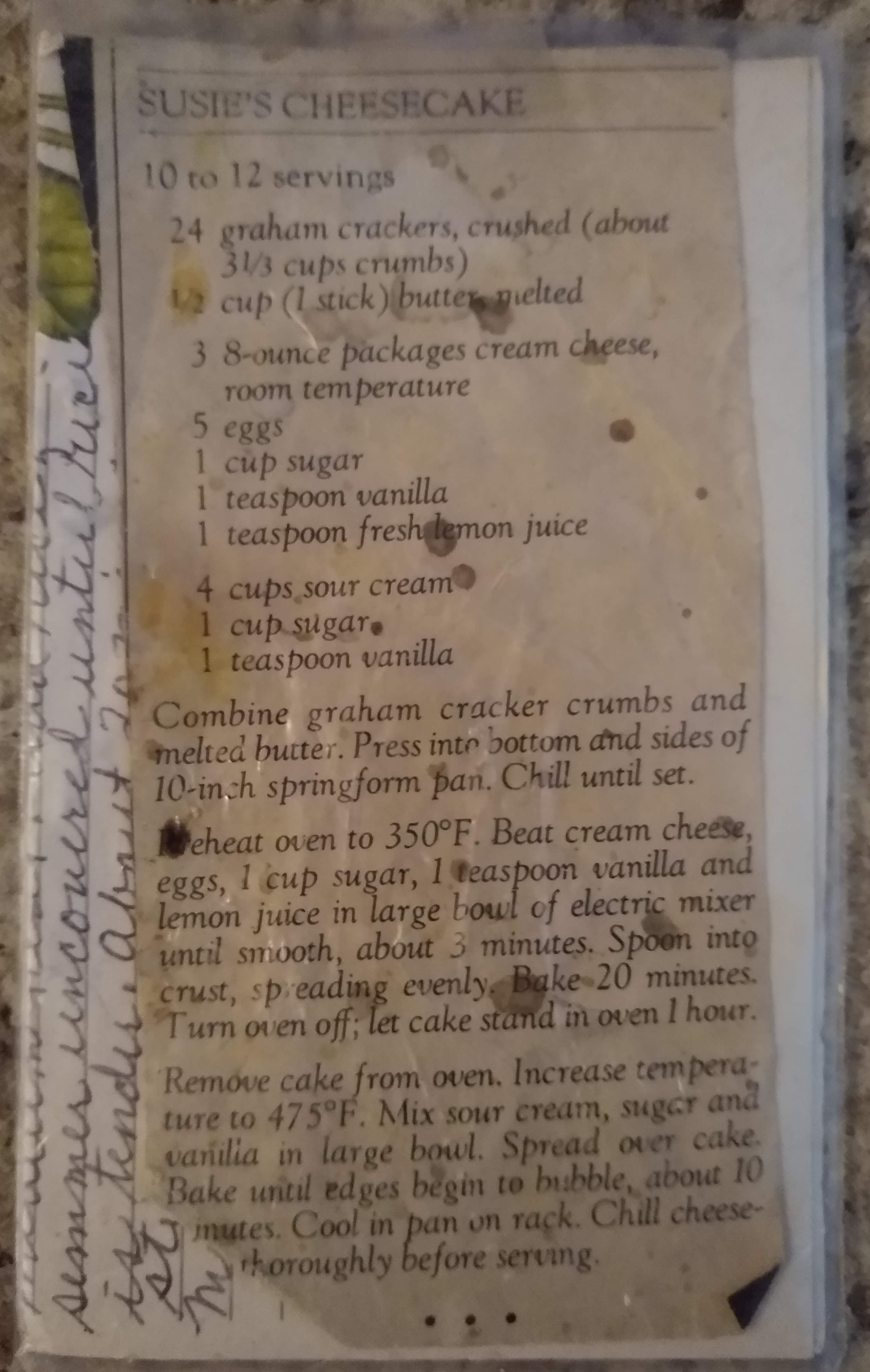A photo of the cheesecake recipe my mom's is based on. It's on magazine paper that's yellowed & stained.